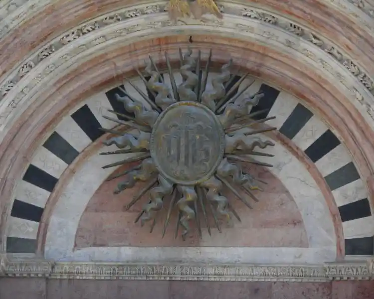 Siena Cathedral exterior design, sun symbol on top